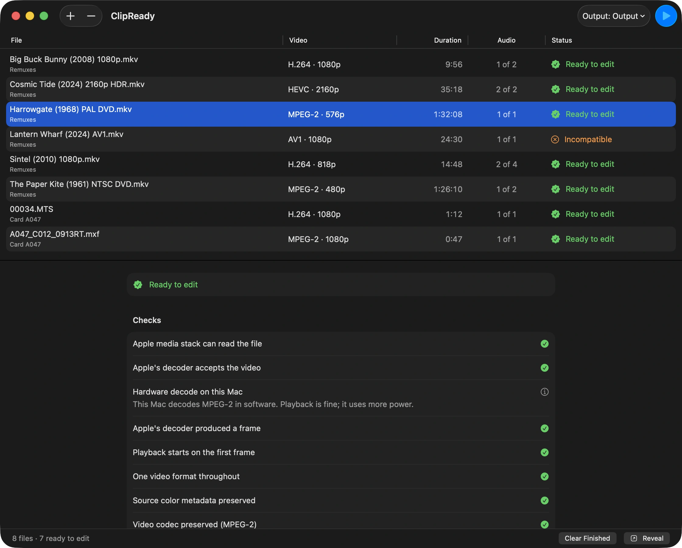 A finished batch: seven files marked “Ready to edit”, one AV1 file marked Incompatible, and the check list for the selected MPEG-2 DVD showing an information icon rather than a green tick, noting that this Mac decodes MPEG-2 in software.
